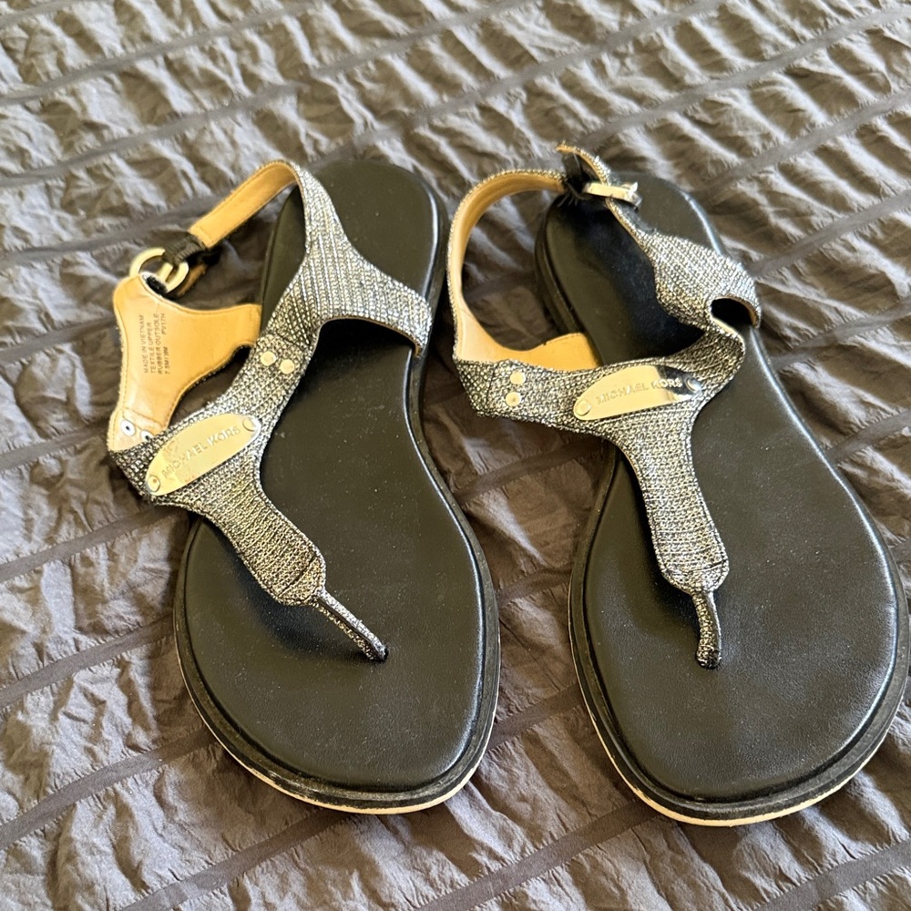 Michael Kors Black and Silver-Textured T-Strap Sandals
